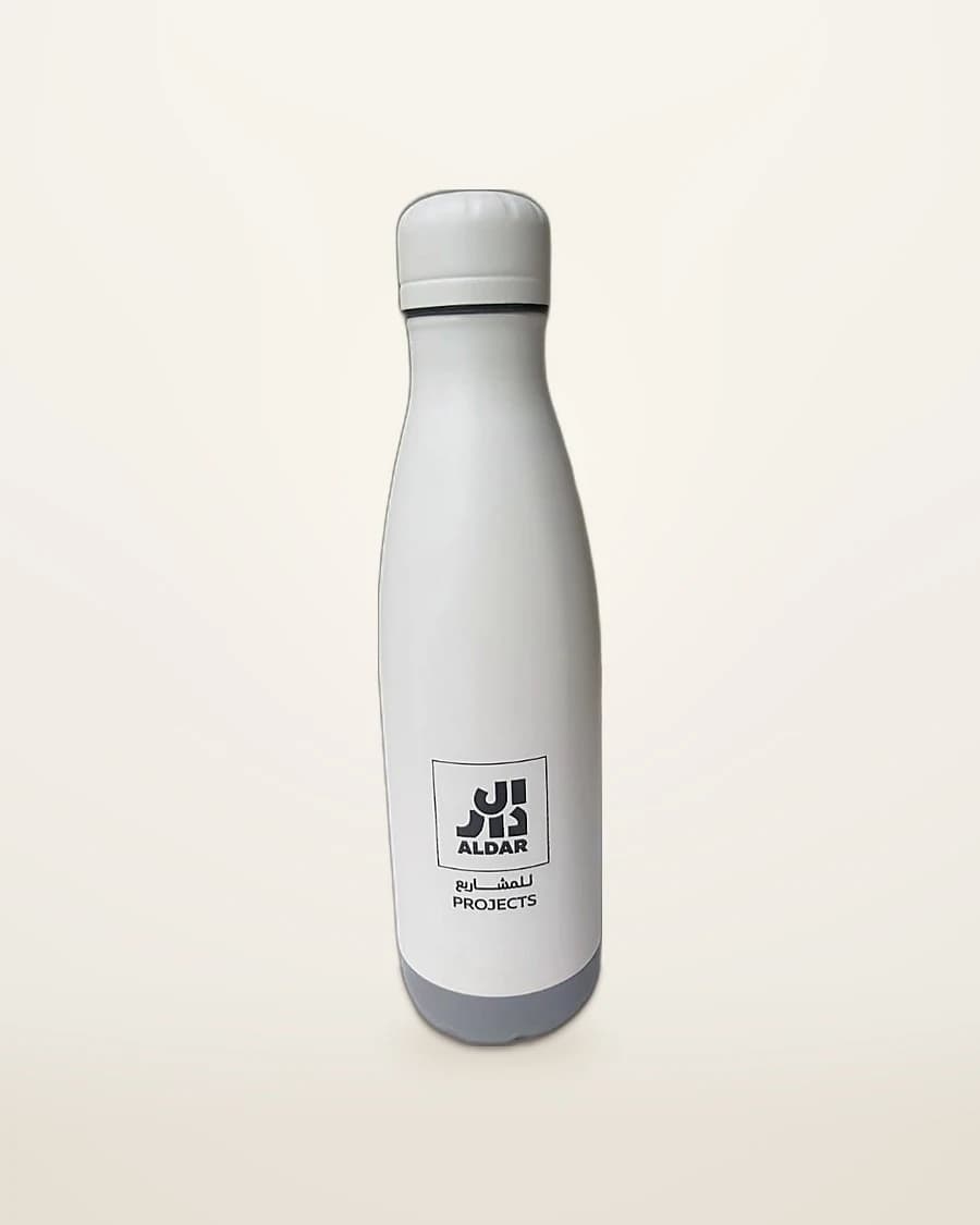 White insulated bottle printed with the Aldar Projects logo in Arabic and English