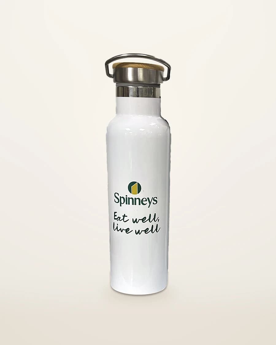 White steel bottle with a bamboo lid, screen printed with the Spinneys logo and Eat well, live well